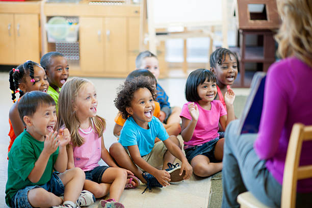 Multi ethnic group of pre-school children in a classroom.